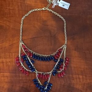 Bansri Gold Tone Necklace with Red and Blue Accents